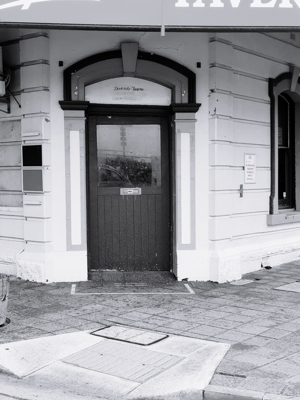 ENTRANCE OF BUILDING WITH STREET LIGHT