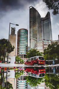 Modern buildings against sky in city