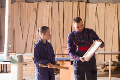 Young man working on wood