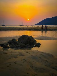 Scenic view of sea at sunset