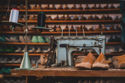 Close-up of sewing machine in shoe store