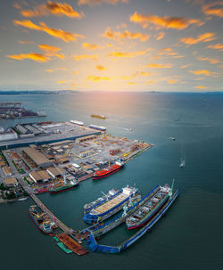 High angle view of city at sunset