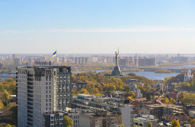 Beautiful panorama of autumn kiev. view from the left bank to the dnieper. wide river in the city 