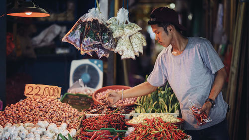 Woman looking at market stall