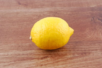 Close-up of lemon on table