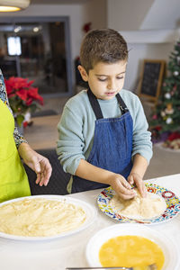 Boy preparing food at home