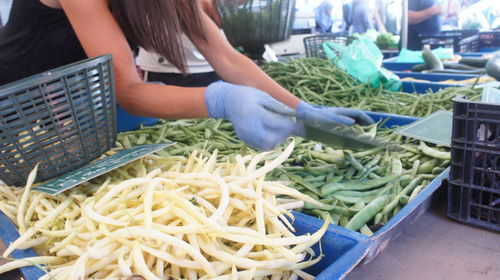 Female vendor at vegetable market