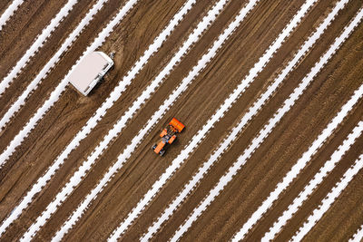 Aerial view of cultivated agricultural field in spring