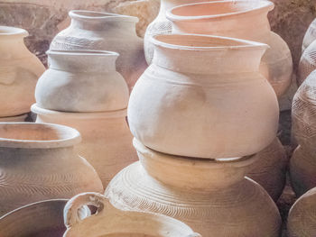 Close-up of containers at market for sale