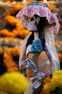 Close-up of decorated human skeleton