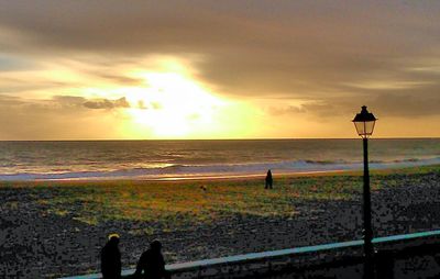 Scenic view of sea at sunset