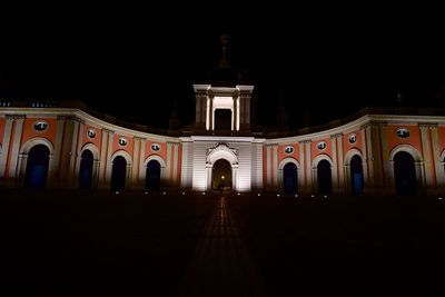 Illuminated cathedral against sky at night