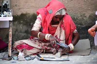 Midsection of woman working