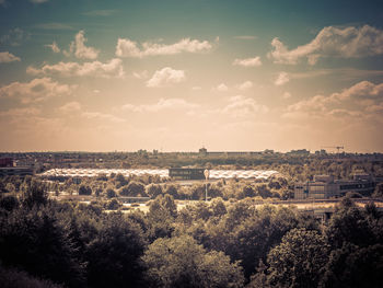 Aerial view of town against sky