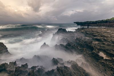 Panoramic view of sea against cloudy sky