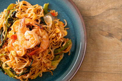 High angle view of pasta in plate on table