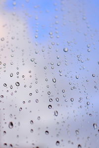 Full frame shot of wet glass window