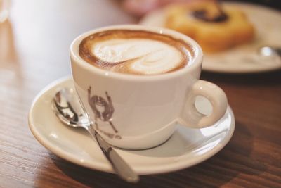 Close-up of cappuccino on table