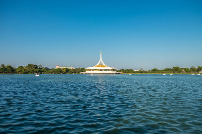 Scenic view of sea against clear blue sky