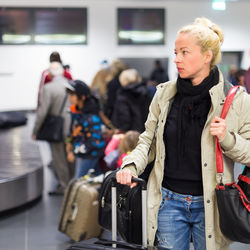 Women standing at airport