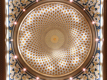 Low angle view of illuminated ceiling