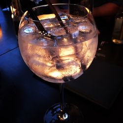 Close-up of wine glass on restaurant table