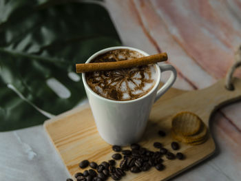 High angle view of coffee cup on table