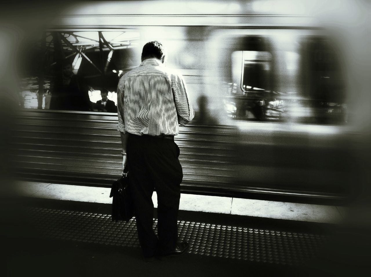 transportation, walking, men, lifestyles, full length, rear view, railroad station platform, illuminated, person, on the move, public transportation, railroad station, indoors, mode of transport, city life, night, travel, leisure activity