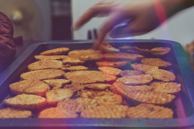 Close-up of hand holding food