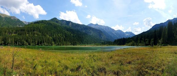 Panoramic view of lake and mountains against sky