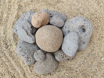 High angle view of pebbles on beach