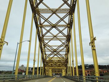 Low angle view of david mccullough bridge against sky