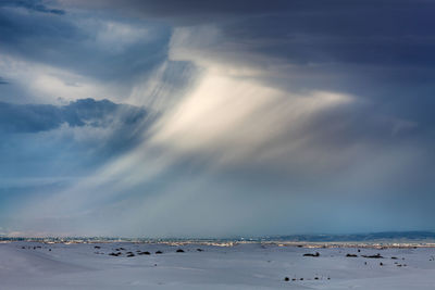 Idyllic shot of dramatic sky over white sands national monument during sunset