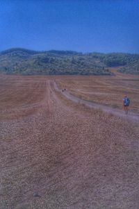 Country road passing through landscape