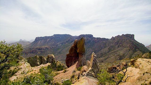 mountain, tranquil scene, tranquility, rock formation, scenics, landscape, geology, sky, physical geography, beauty in nature, mountain range, nature, rock - object, non-urban scene, rocky mountains, cliff, rock, travel destinations, remote, idyllic