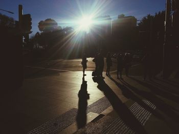 Sun shining through city