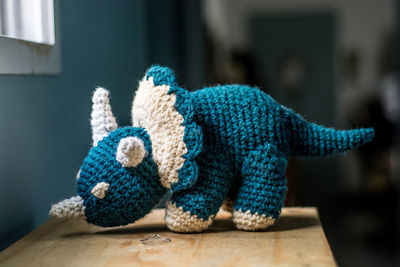 Close-up of stuffed toy on wooden table