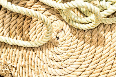 Close-up of ropes during sunny day