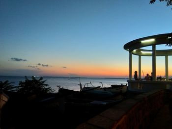 Scenic view of sea against sky at sunset