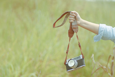 Person holding camera