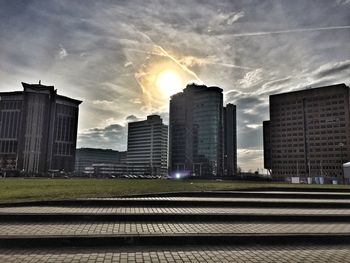 Skyscrapers in city against sky