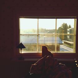 View of residential building through window