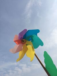Close-up of colorful pinwheel toy against sky