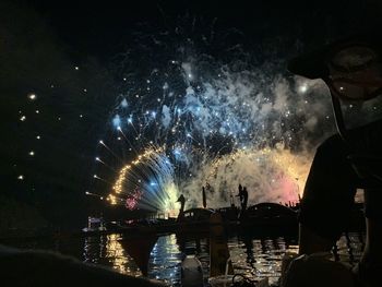 Firework display at night