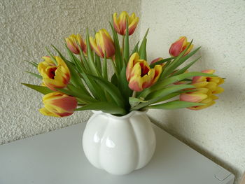 High angle view of tulips in vase on table