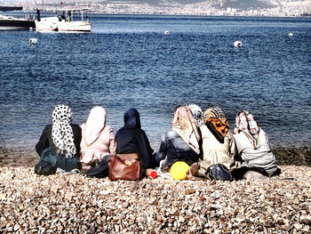 People relaxing at beach