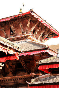 Low angle view of temple building against sky