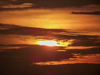Scenic view of dramatic sky during sunset