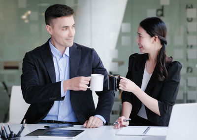 Business colleagues working at office