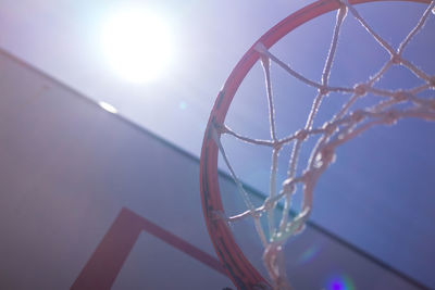 Low angle view of basketball hoop against sky